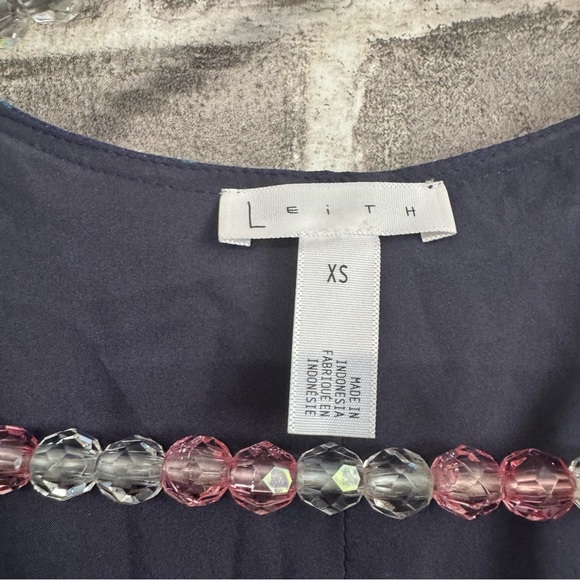 Leith Worn by Actress Laura Onnes Navy Blue Pink Floral Ruffled Wrap Midi Dress - Picture 5 of 11